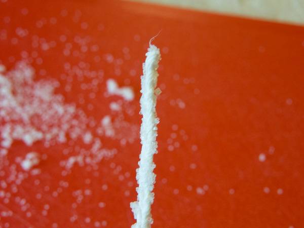 white powder in a red table