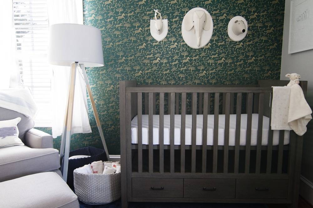 A gray and green themed nursery.