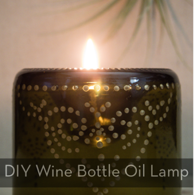 A wine bottle turned into an oil lamp.