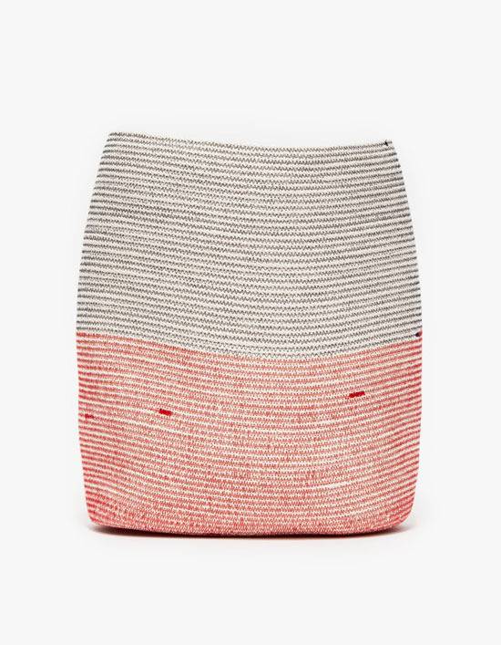 White and pink thick threaded hamper.