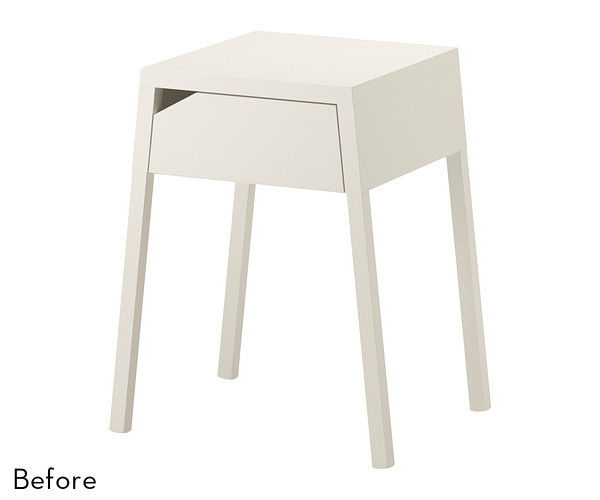 A beige mid-century modern table has a cut out instead of a drawer pull.