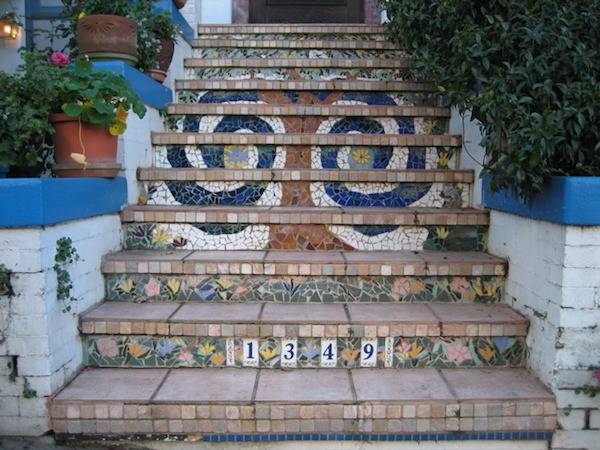 Decorative steps with the number 1349 lead up to a house.