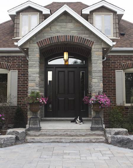 A big house with a large door entrance