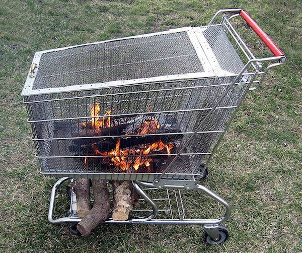 "log are kept below the fire in steel cart ."