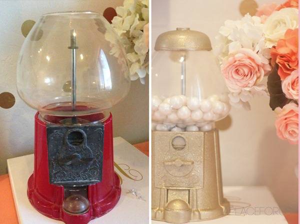 Two gumball machines are standing on white surfaces.