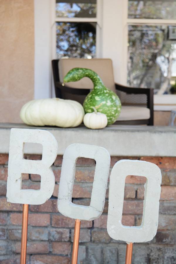 The word "BOO" as garden art made of concrete.