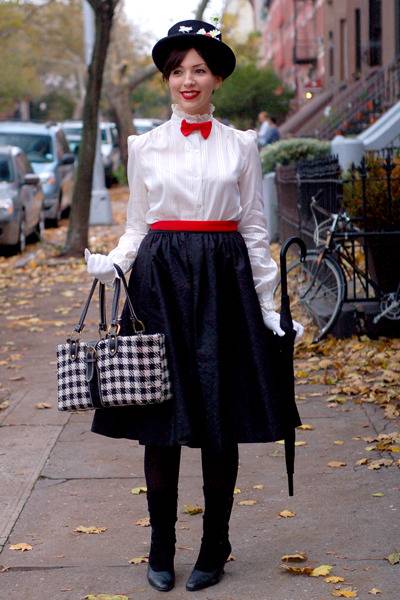 A woman dressed as Mary Poppins.
