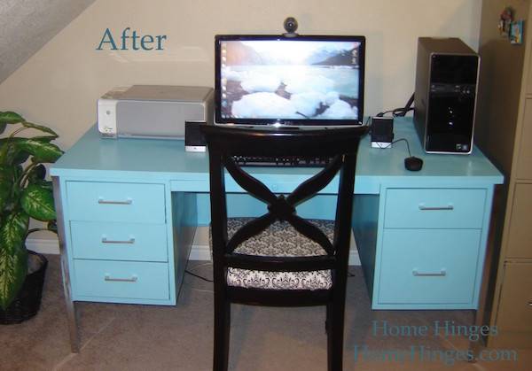 An after picture shows a baby blue desk with a screen on it and a chair with  it.