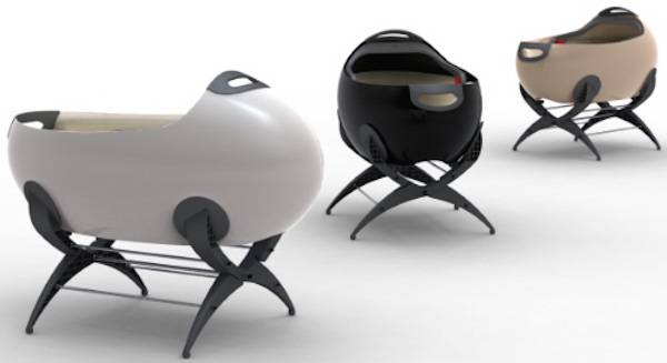 3 rounded pod shaped baby bassinets in white, black and beige.