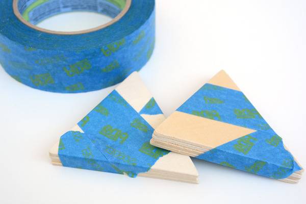 Tape the triangle together tightly so that you can drill more then one at a time.