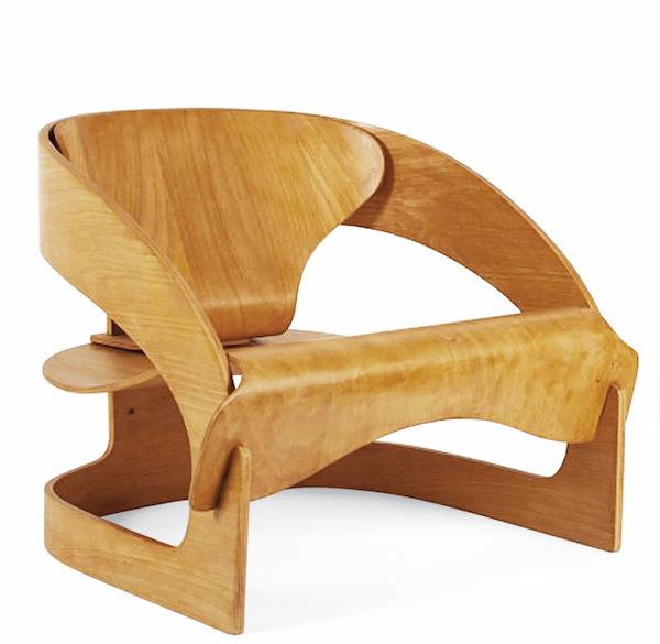 Wooden chair with a unique design.