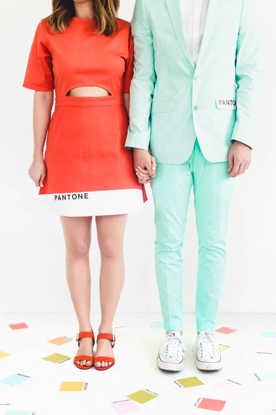 A man and woman dressed in pastels.