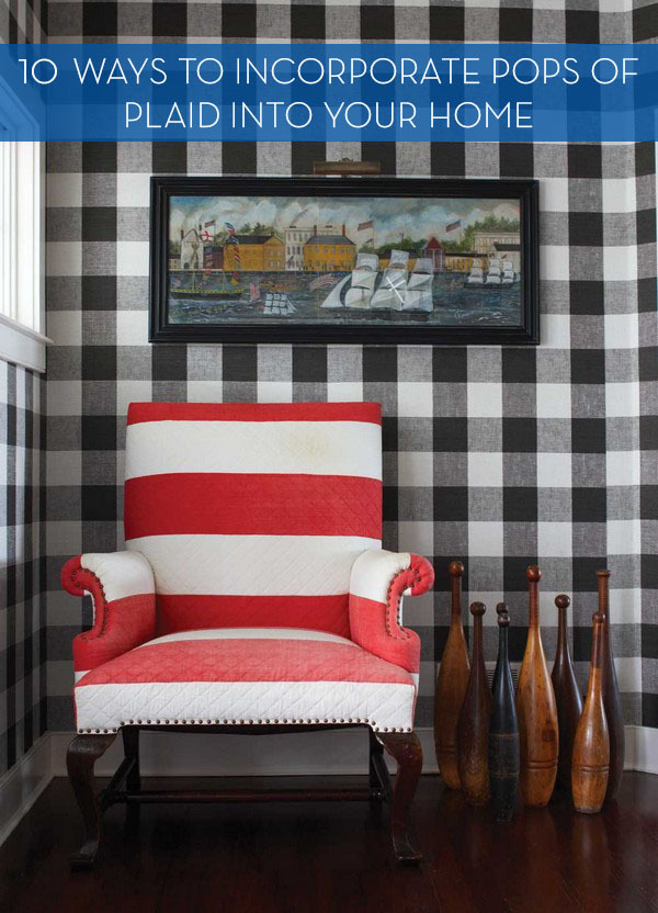 A red and white striped chair is in a black and white plaid background.