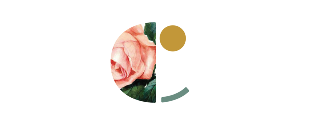 A pink rose is within an emblem.