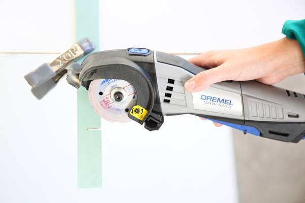 A Dremel tool ready for cutting a tree.