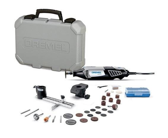 Rotary tool kit complete with carrying case and contents laying on top of a white table.