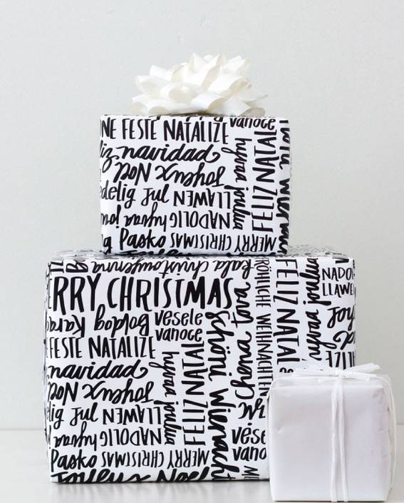 Three gifts are wrapped in paper and have bows.