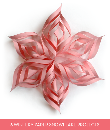 Pink colored paper snowflake.