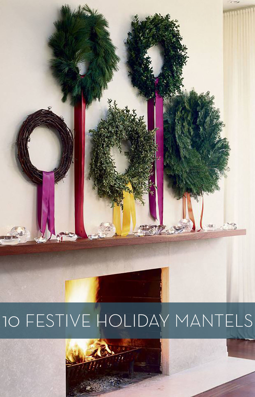 White fireplace with five various wreaths above the mantel.
