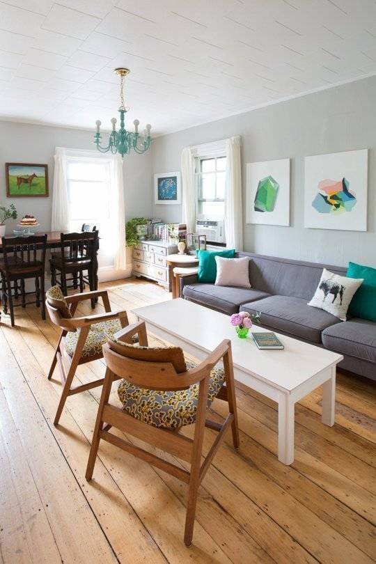 "Hall with furnitures and pictures on wall."