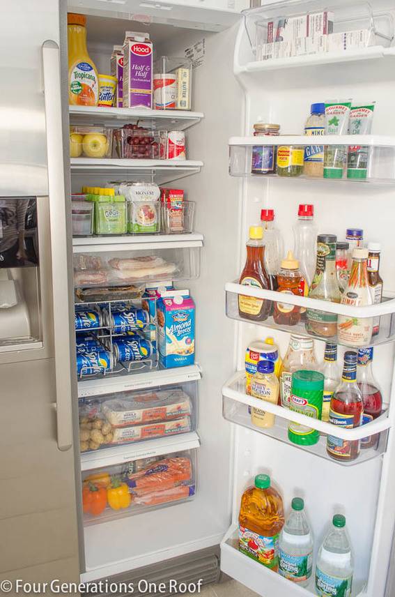 A fridge full of of liquid bottles