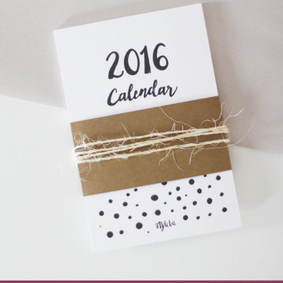 2016 printable calendar tied with a tread.