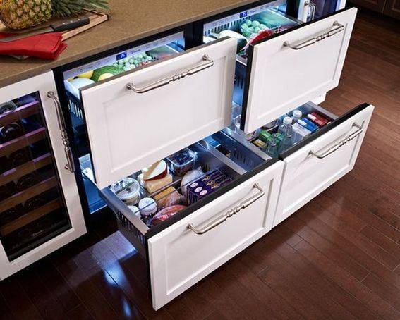 Drawers under the counter are open and showing their contents.