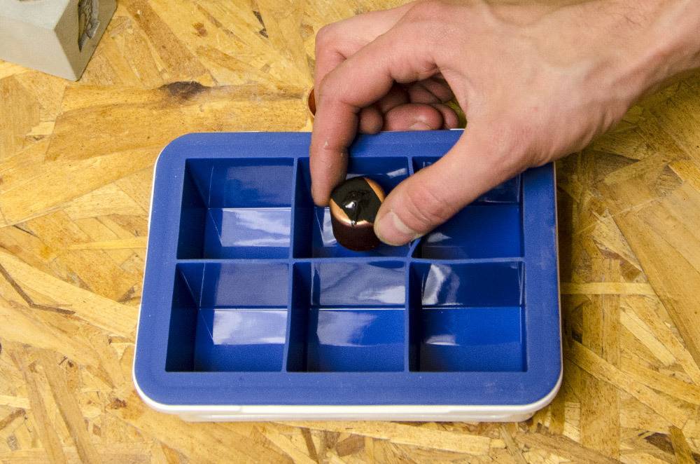 A tray for making concrete cubes.
