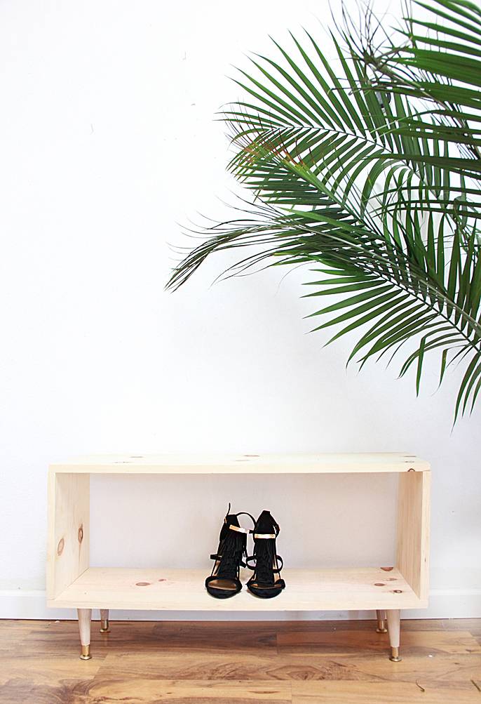 Wooden rack for footwear.