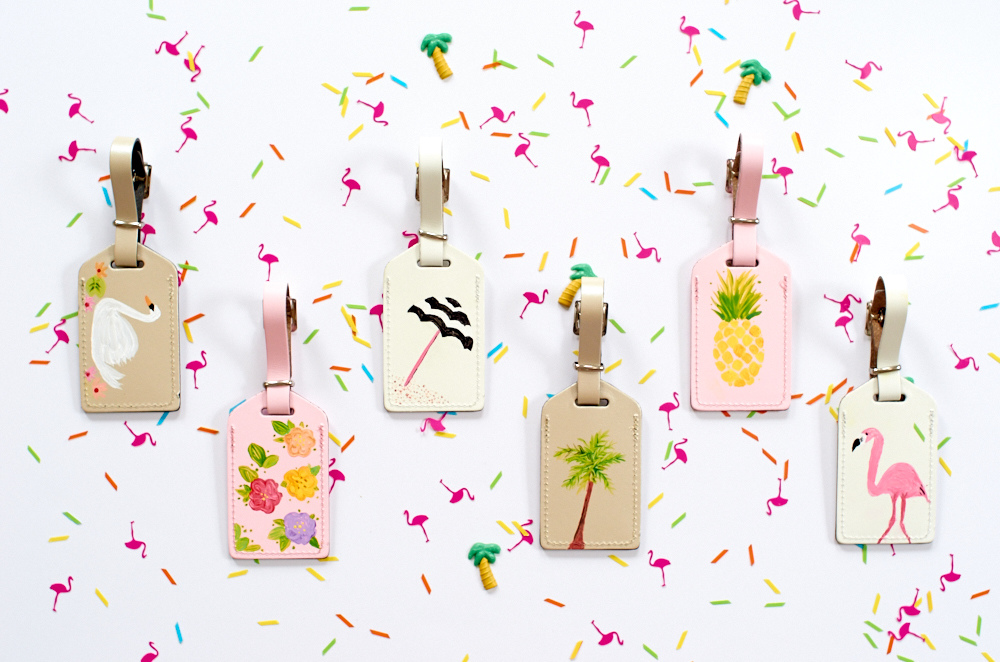 Suitcase luggage tags against a festive background.