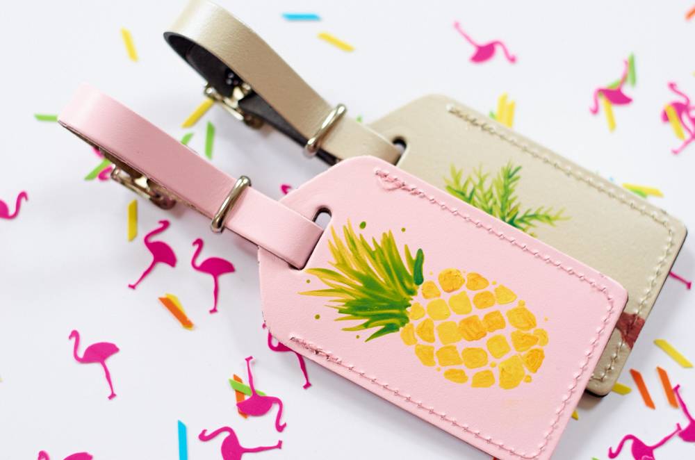 Two leather tags are visible on a flamingo patterned print.