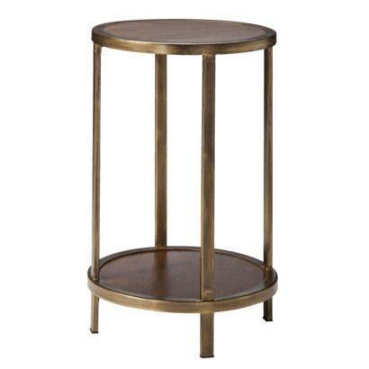 A round, two-shelf table.