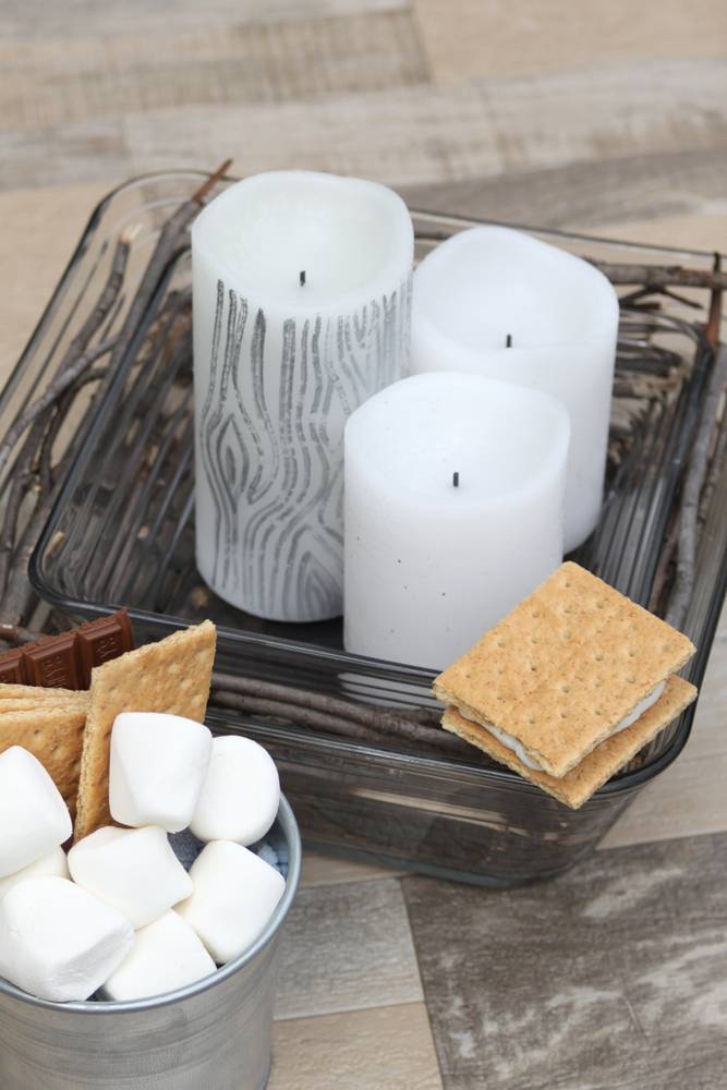 Use daytime candles normally, and then switch out for an alcohol candle when you want to make a s'more!