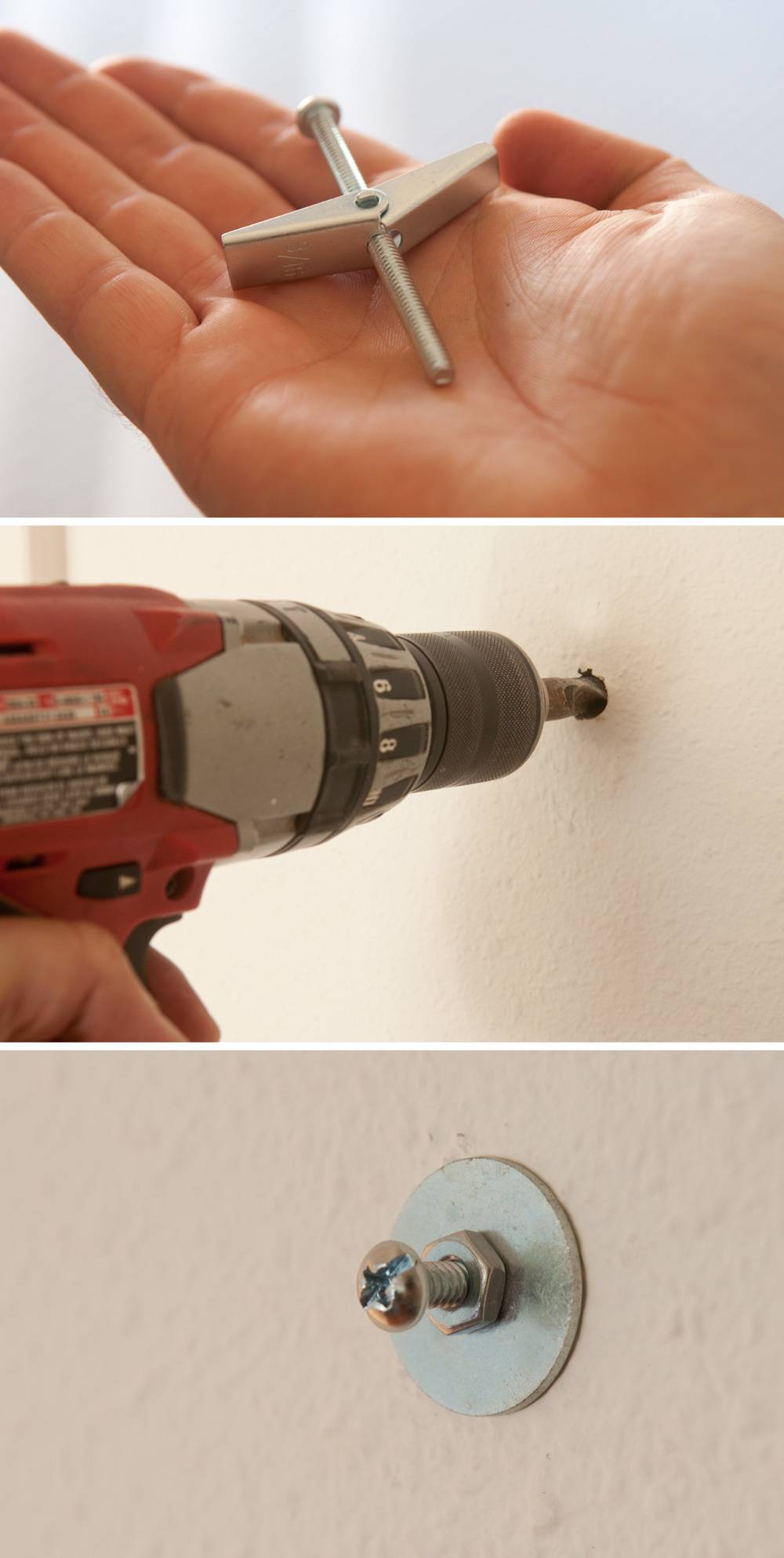 A person using a drill and screw tool on a wall.