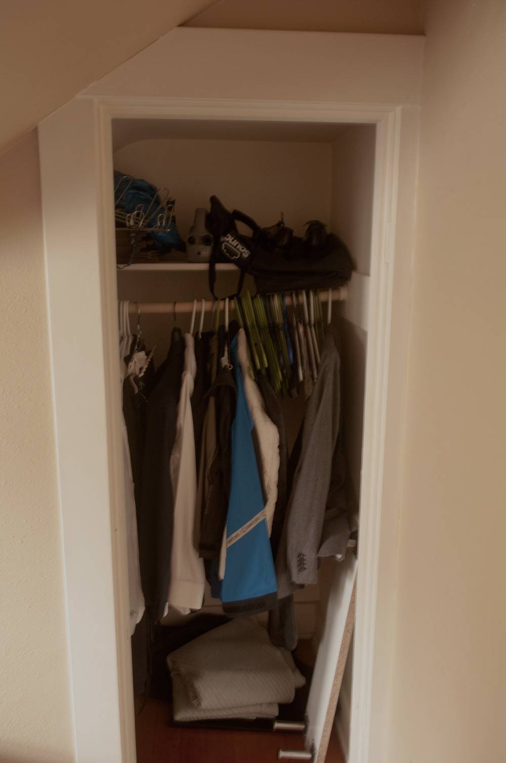 closet with little organized clothes