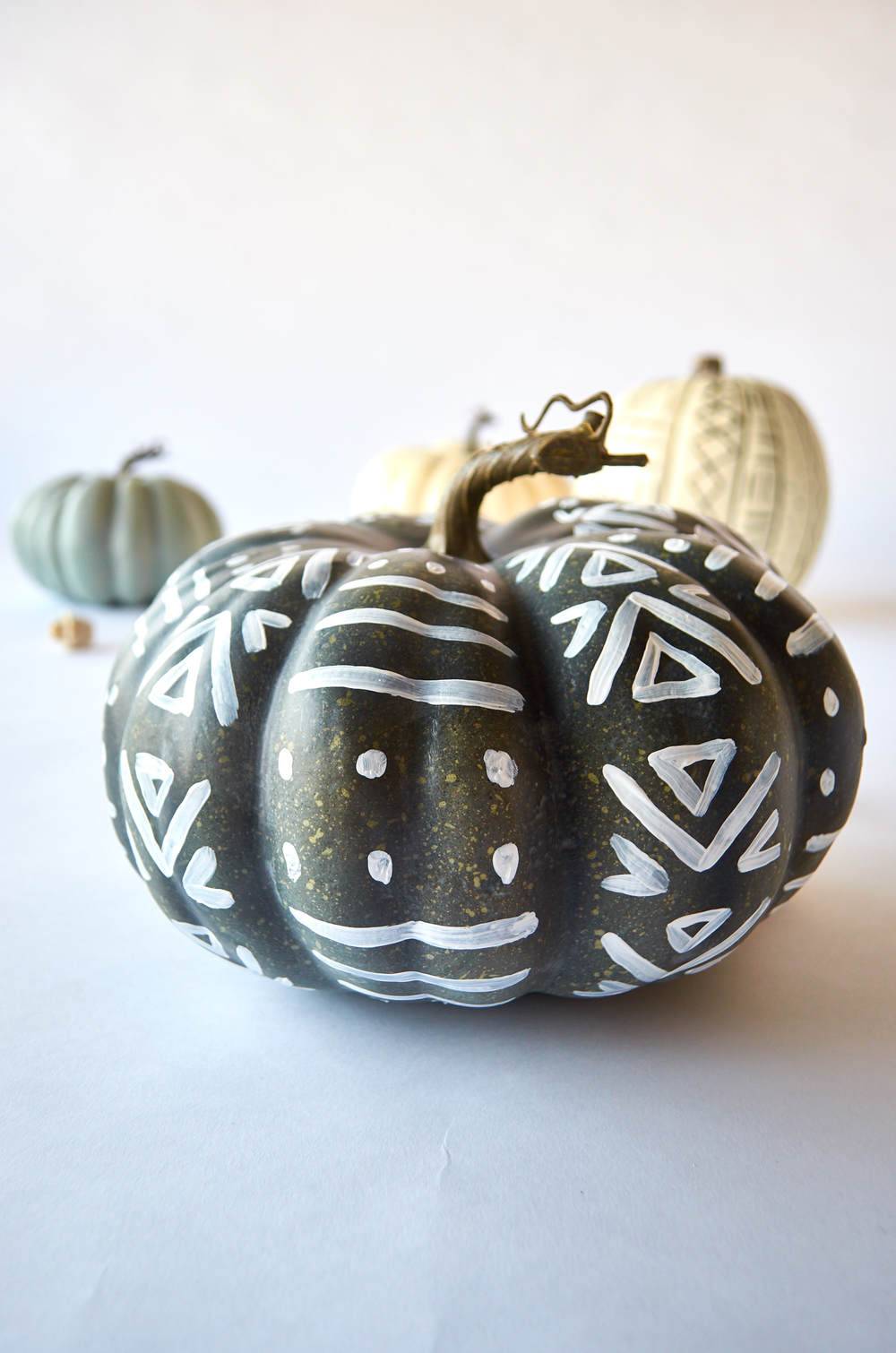 A pumpkin that has been decorated.