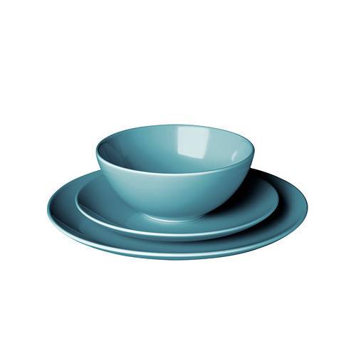 A blue three piece bowl and saucer set.