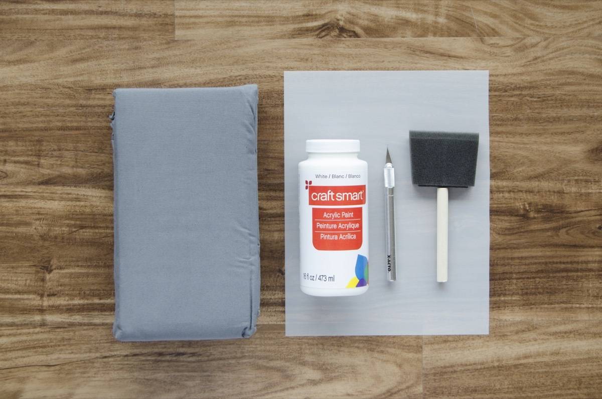 Materials needed to stencil a mud cloth design