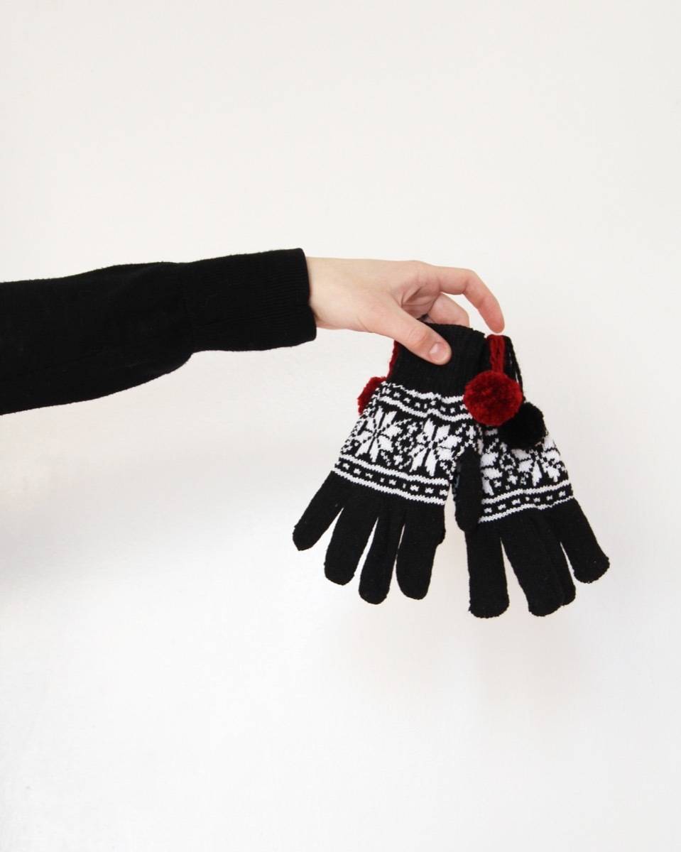 Learn how to add tassels to a pair of gloves.