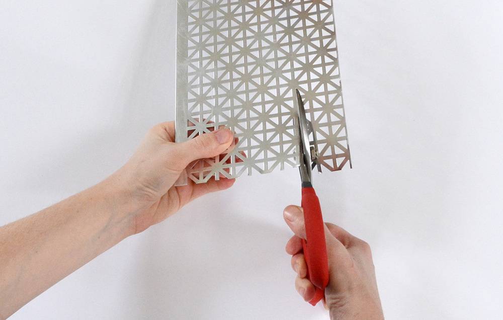 cut radiator cover sheet with tin snips