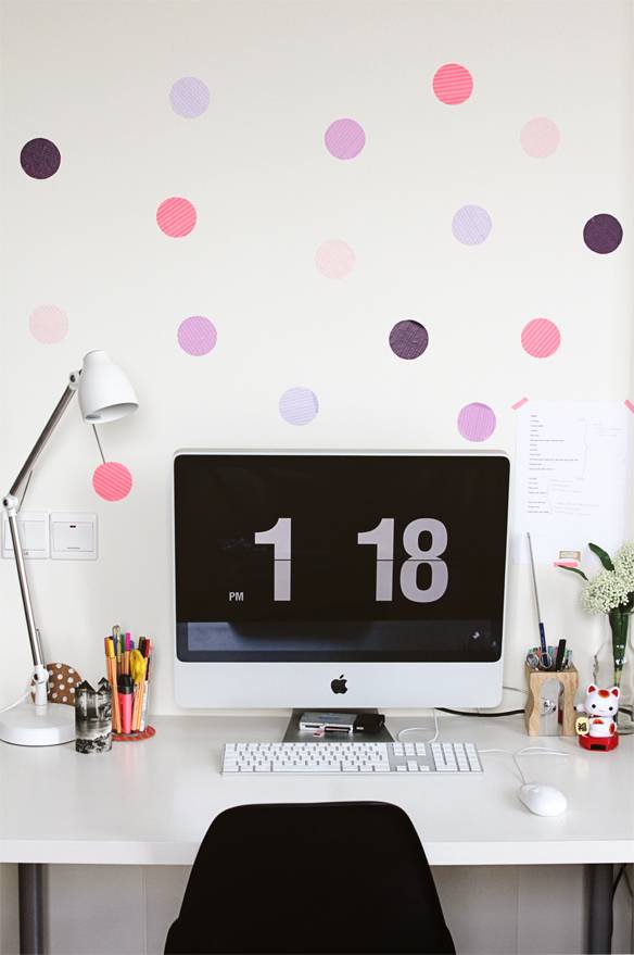 Use paper polka dots to create an office space accent wall. 
