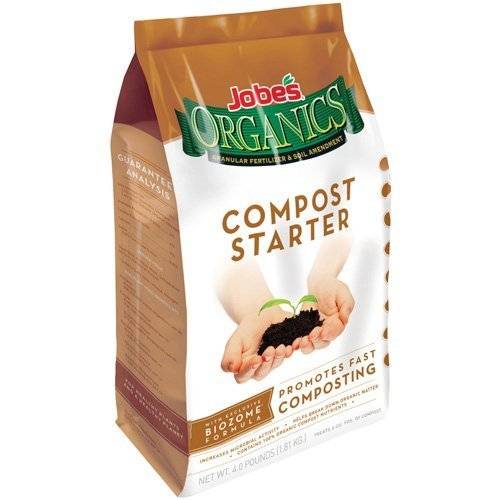 A bag of organic compost starter has a picture of two hands holding a soil with a sprouted extended from the top.