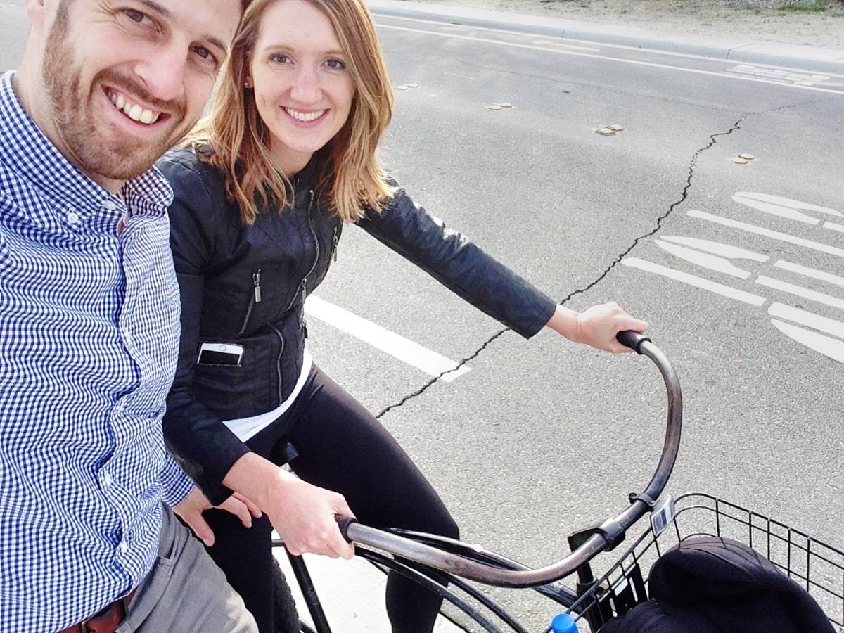 Man and woman taking selfie on a bike ride