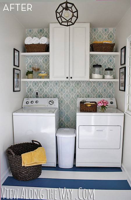 A washer and dryer are sitting together in a room.