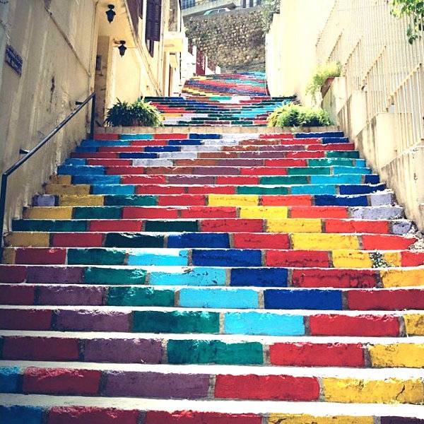A colorfully painted outdoor stairwell.