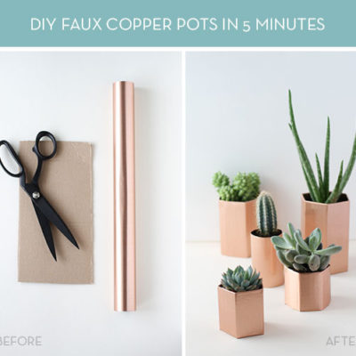 Faux copper planters holding succulents, and a pair of scissors.