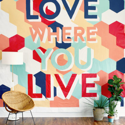 A colorful mural that says "Love where You Live"