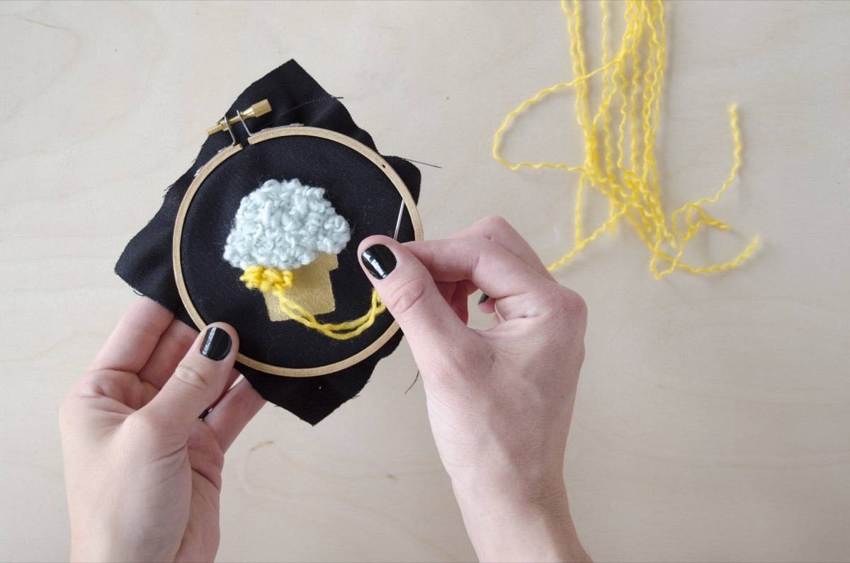 Create a custom patch from fuzzy strands of yarn