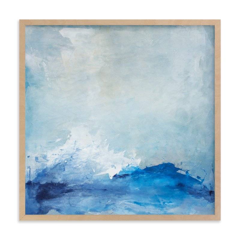 Framed painting of crashing waves and an overcast sky.