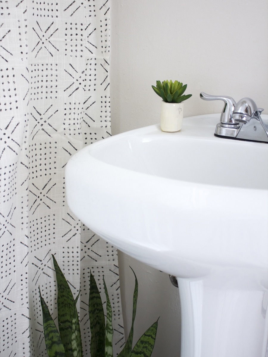 Minimalist Modern Bright Shower Room With A Daylight Lamp In The Ceiling To  Create The Illusion Of A Window Dark Hardware To Create Contrast With Light  Walls Shower Toilet Bidet And Washbasin